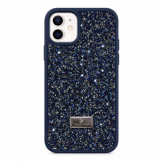A navy blue phone case covered in dense blue, silver, and white glitter, featuring a silver-tone metal Swarovski logo plate on the lower back, shown on a plain white background.