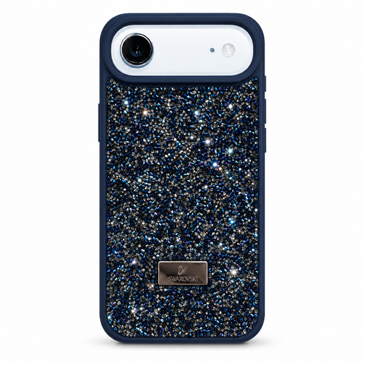 A protective phone case with a navy blue border and a back covered in dense blue, silver, and white glitter. A silver metallic Swarovski brand plate is mounted near the bottom.