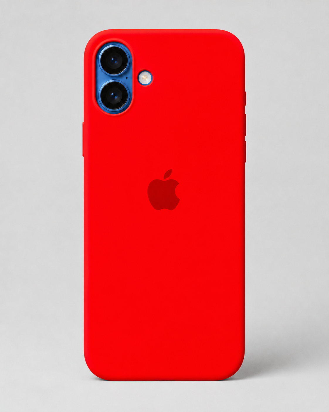A bright red phone case on an iPhone, shown from the back against a neutral light gray background. The Apple logo is visible through the center of the case.